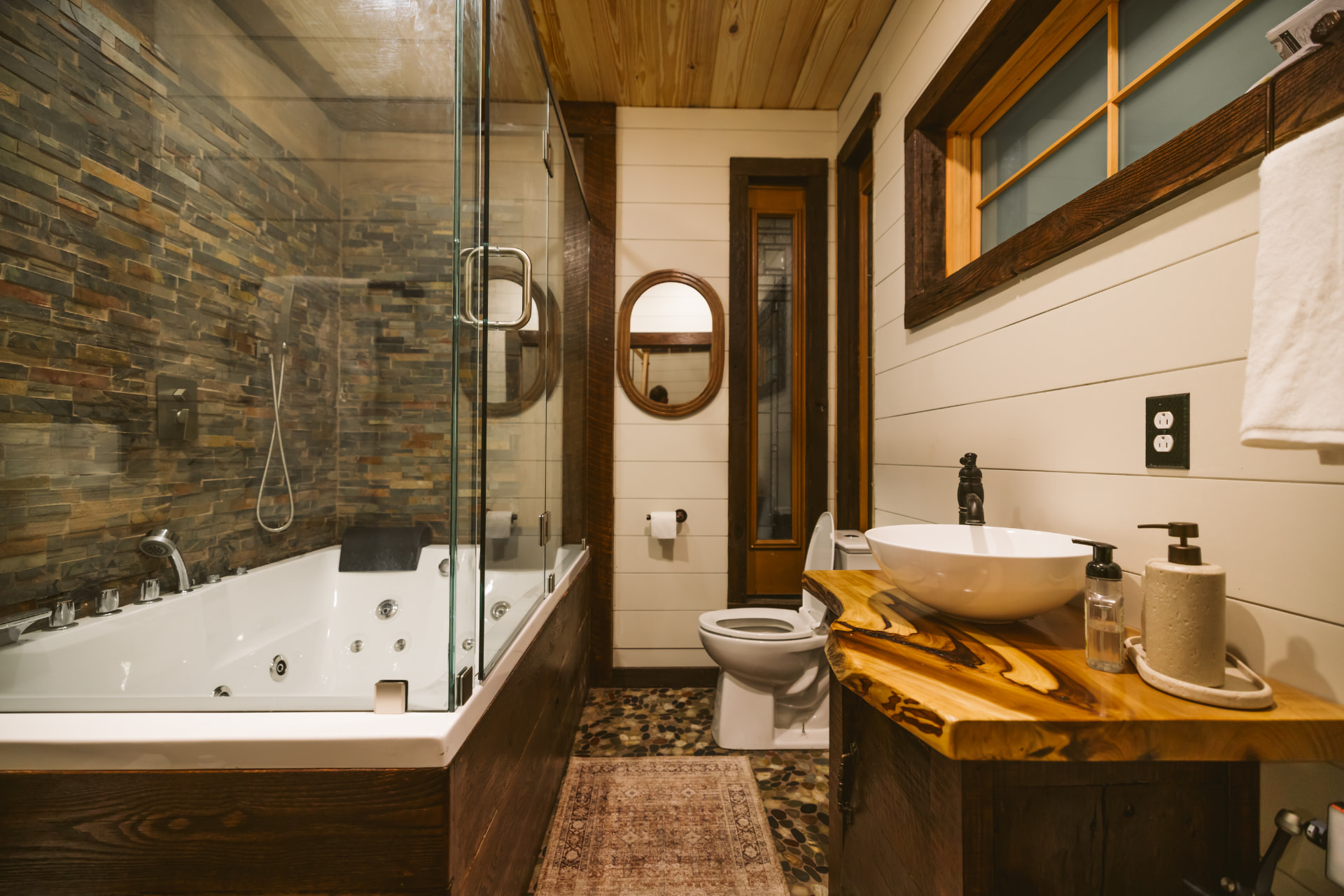 Bathroom with jetted tub and slate shower